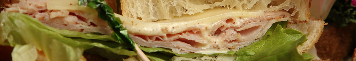 Eating Sandwich Cafe at Java Plus Cafe & Catering restaurant in St. Louis, MO.